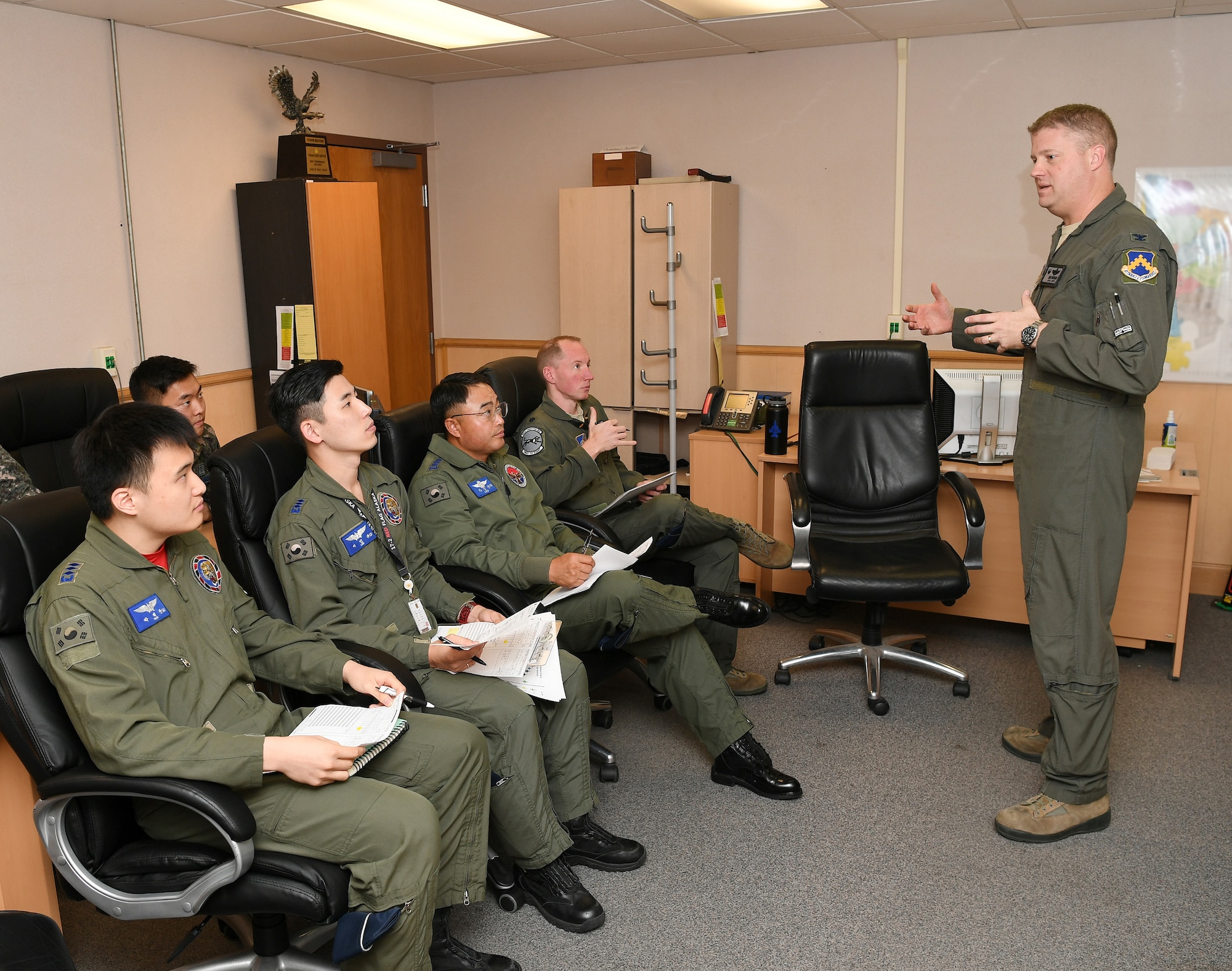 Col. David G. Shoemaker, “Wolf”, 8th Fighter Wing commander, reviews mission plans with U.S. Air Force and Republic of Korea Air Force pilots during the “Friendship Flight” mission pre-flight brief at Kunsan Air Base, Republic of Korea, Oct. 30, 2017. The “Friendship Flight” continued a long history of various joint training missions focused on strengthening partnerships and capabilities between the two nations, ensuring combined combat readiness on the Korean Peninsula.