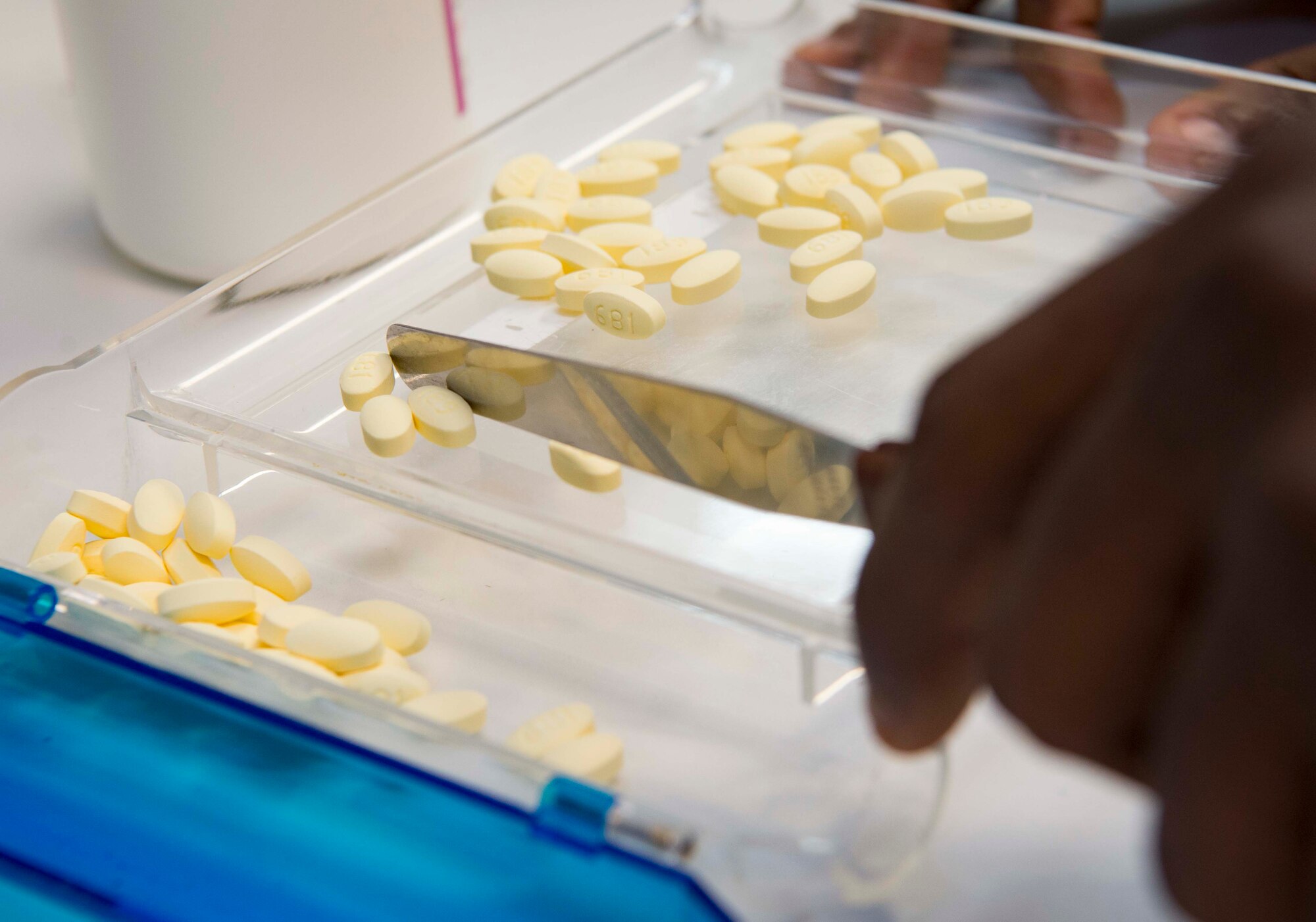 Airman 1st Class Jasiah Sellars, 86th Medical Squadron Pharmacy apprentice, counts medication for a prescription on Ramstein Air Base, Germany, Oct. 25, 2017.