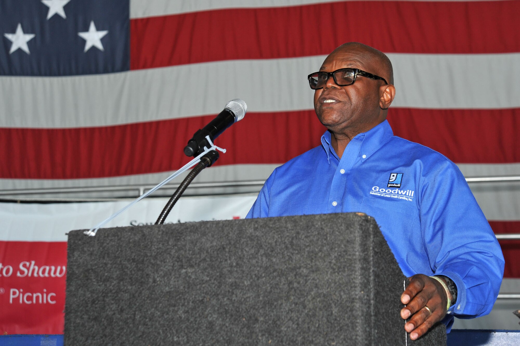 Anthony Green, Navy veteran and guest speaker, speaks to attendees at the 18th Annual AbilityOne Picnic at Shaw Air Force Base, South Carolina, Oct. 27, 2017.