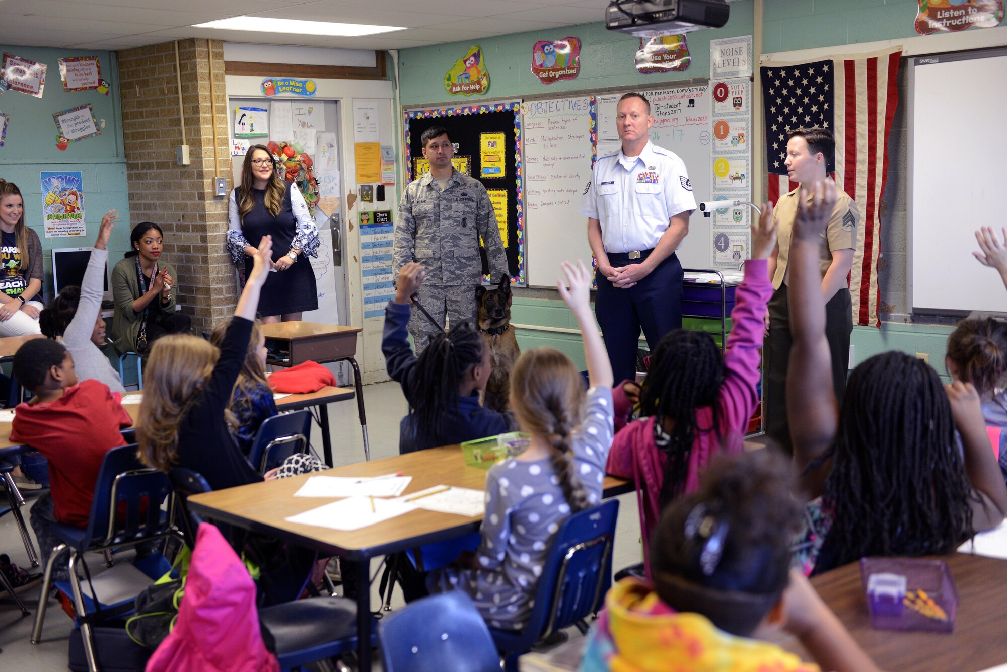 Military personnel from Little Rock Air Force Base, Ark., talk to Tolleson Elementary School students Oct. 26, 2017, during Red Ribbon Week activities.