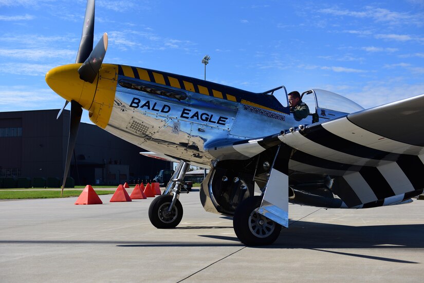 Pilot inside of P-51 Mustang about to take-off.