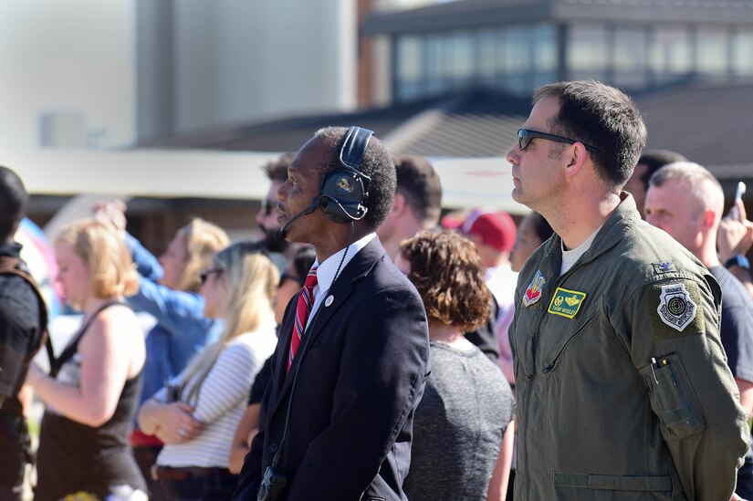 Donnie Tuck, City of Hampton mayor watches F-22 Raptor demonstration with crowd.