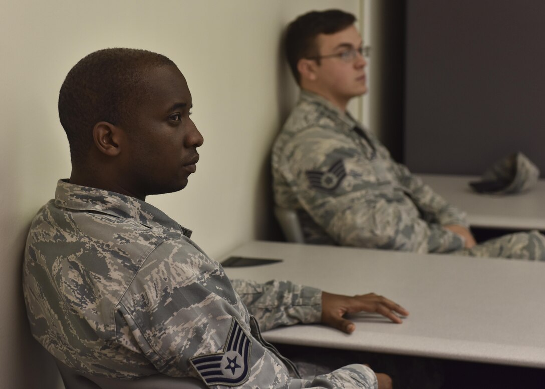 U.S. Air Force Airmen attend a Tuition Assistance briefing at the Education Center on Joint Base Langley-Eustis, Va., Oct. 24, 2017.