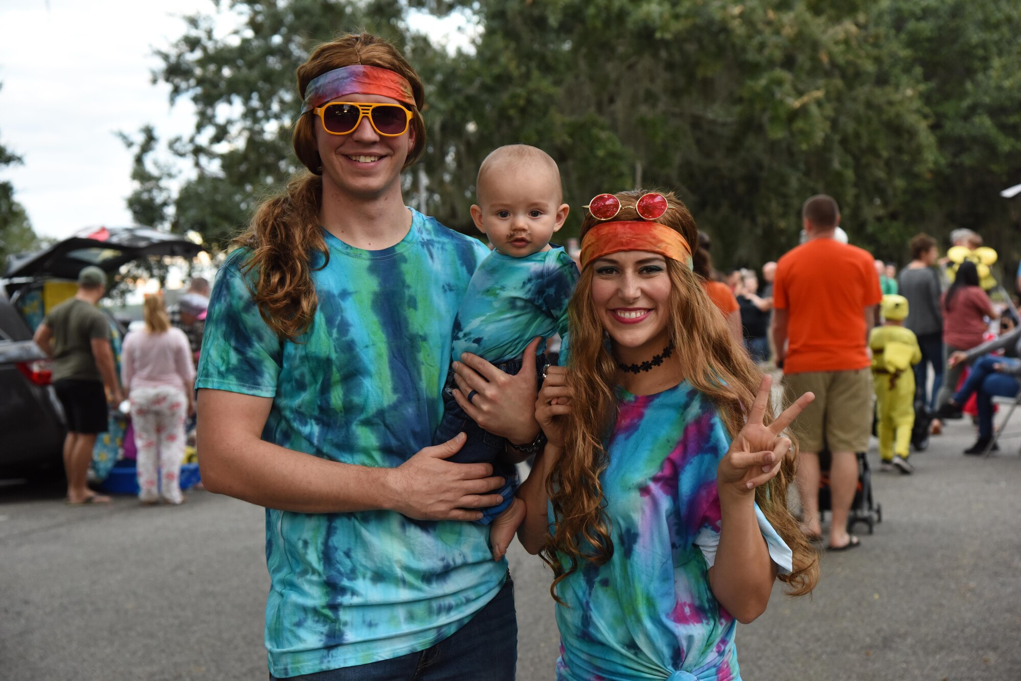 Staff Sgt. David Turner III, 81st Security Forces Squadron unit trainer, Heather Turner, 81st Force Support Squadron marketing assistant, and their son, Peyton, pose for a photo during Ghouls in the Park at Marina Park Oct. 27, 2017, on Keesler Air Force Base, Mississippi. Ghouls in the Park also featured an alien bus, a haunted house, “Trunk or Treat” and games for children of all ages. (U.S. Air Force photo by Kemberly Groue)