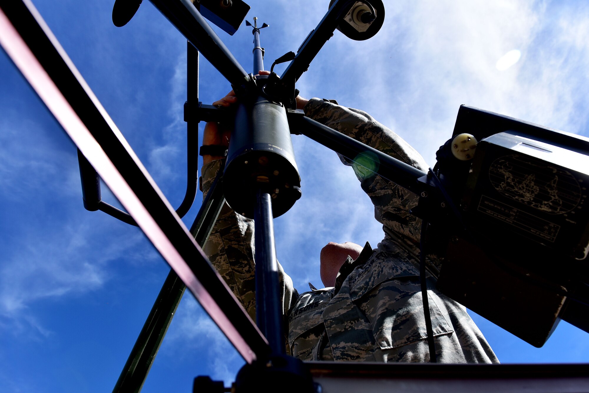 Staff Sgt. Jason Parsons, 19th Operations Support Squadron NCO in charge of the weather flight, assembles a Tactical Meteorological Observing System Oct. 23, 2017, at Little Rock Air Force Base, Ark. The system is capable of reading multiple aspects of weather including: wind direction, cloud height, temperature and dew point. (U.S. Air Force photo by Airman Rhett Isbell)