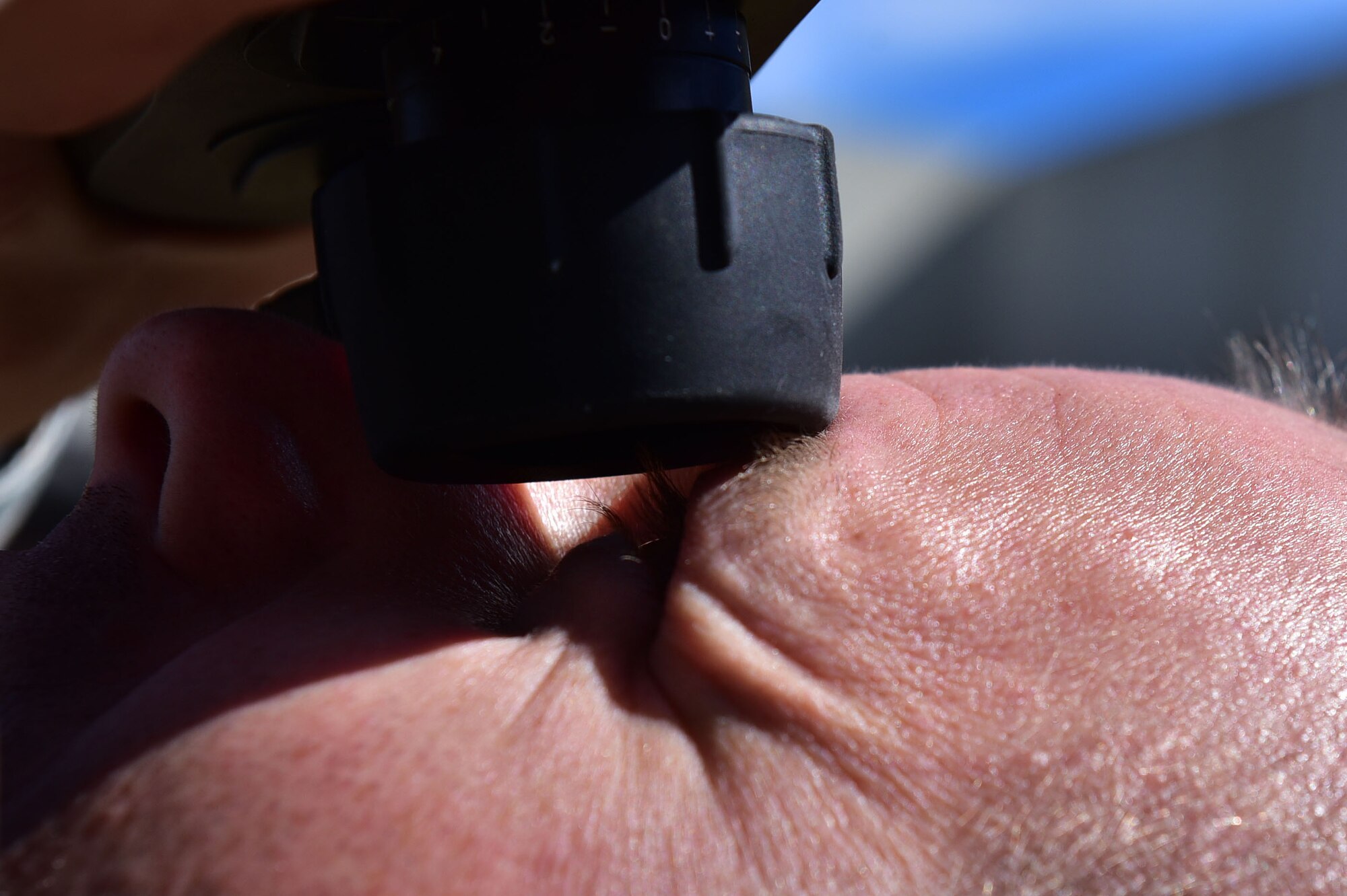 Staff Sgt. Jason Parsons, 19th Operations Support Squadron NCO in charge of the weather flight, looks through a laser range finder to read the height of the clouds Oct. 23, 2017, at Little Rock Air Force Base, Ark. Weather Airmen monitor weather patterns on a 24/7 schedule to alert aircrews and Team Little Rock members of severe weather conditions. (U.S. Air Force photo by Airman Rhett Isbell)