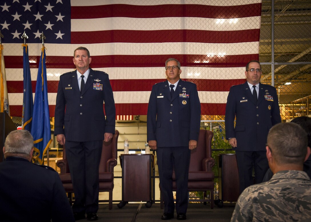 Col. Andrew P. Keane, 108th Wing Commander, left, outgoing 108th Mission Support Group Commander Col. Vito Dimicco, center, and incoming MSG Commander Lt. Col. Steven Rothstein look on during a change of command ceremony at Joint Base McGuire-Dix-Lakehurst, N.J., Oct. 15, 2017. (U.S. Air National Guard photo by Master Sgt. Matt Hecht)