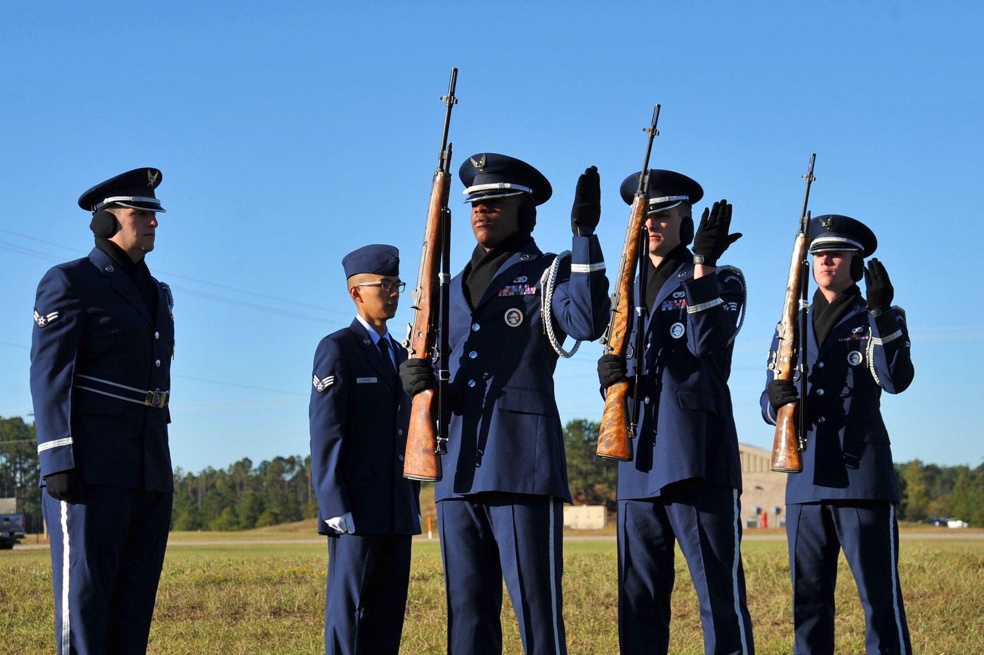 U.S. Airmen temporarily assigned to the 20th Force Support Squadron Honor Guard participate in a firing detail during a simulated funeral at an honor guard graduation at Shaw Air Force Base, South Carolina, Oct. 30, 2017.