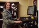 Col. Theresa Medina, 319th Medical Group commander, poses for a photo at her desk Oct. 30, 2017, at Grand Forks Air Force Base, North Dakota. Medina was diagnosed with stage one breast cancer a few years ago and overcame the illness with the help of Tricare and the support of family and friends. (U.S. Air Force photo by SrA Cierra Presentado)