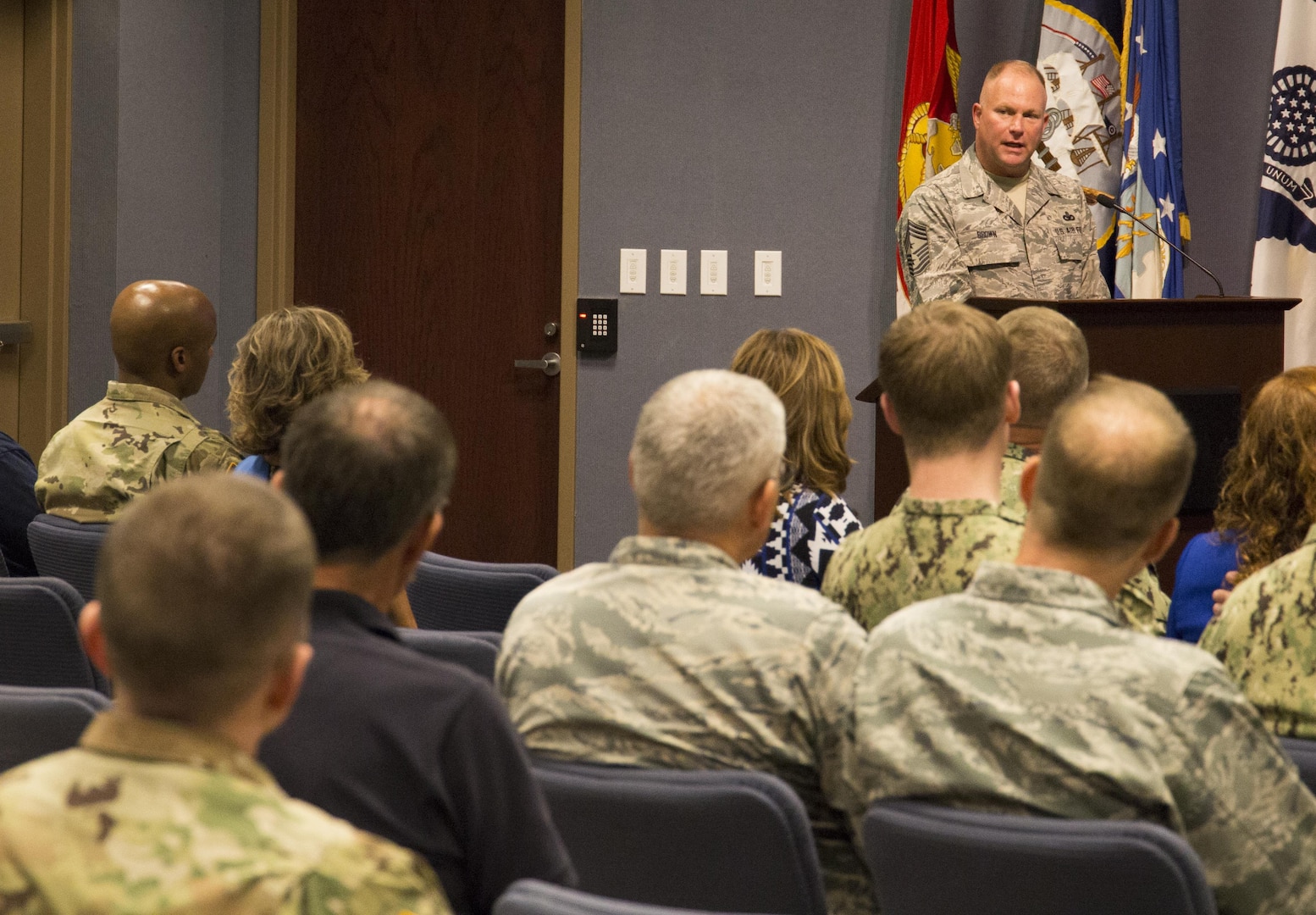 Maj. Gen. Richard Gallant, commander, Joint Task Force Civil Support hand the command colors to Chief Master Sgt. James Brown, senior enlisted leader, JTF-CS during a Change of Responsibility ceremony here Oct. 27, 2017. Brown is the ninth senior enlisted leader to take responsibility of JTF-CS in its 18 year history.