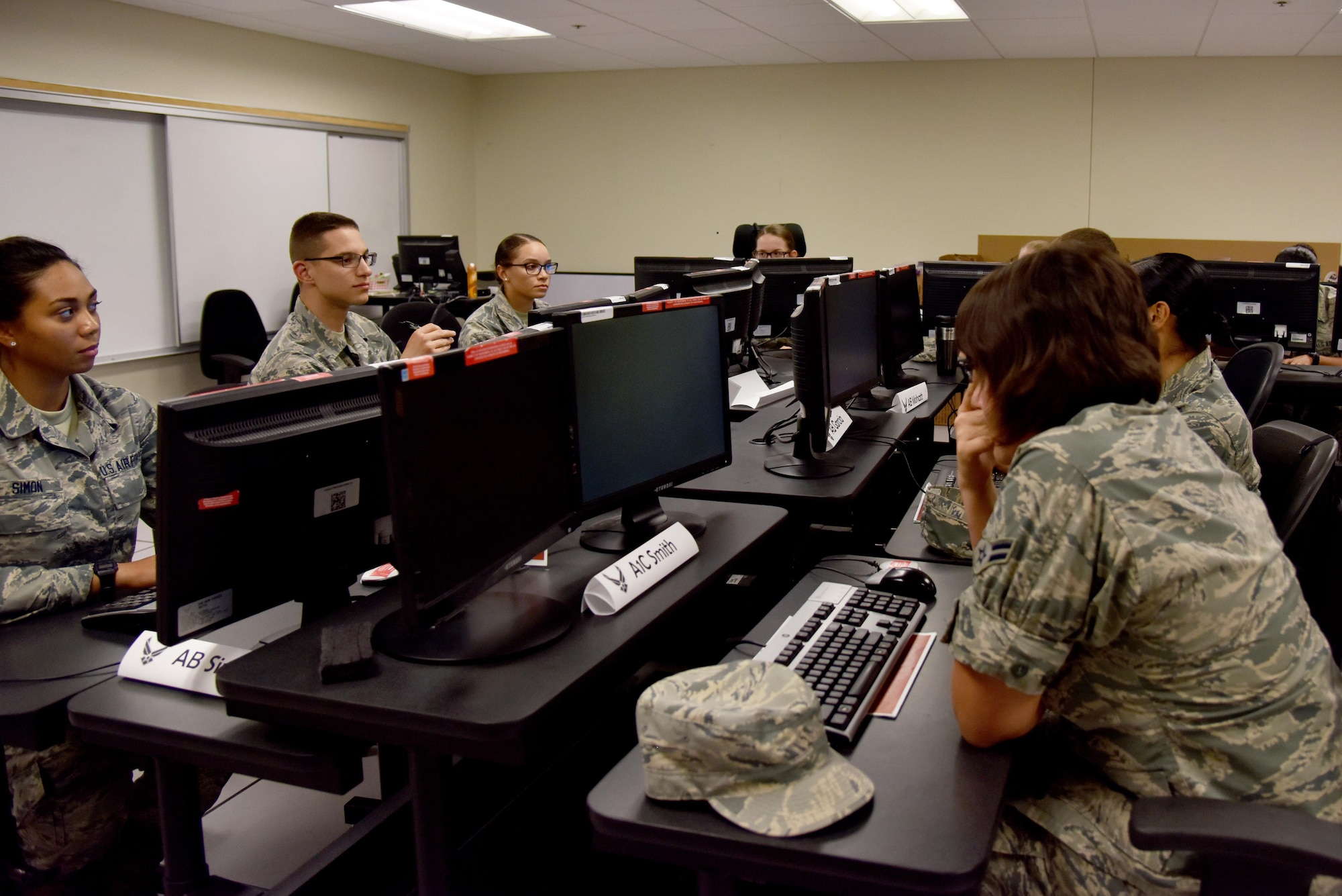 315th Training Squadron students sit in one of the old-style classrooms at the Di Tomasso Hall on Goodfellow Air Force Base, Texas, June 21, 2017. The 315th TRS is currently in the process of updating its classrooms to foster a better learning environment for students. (U.S. Air Force photo by Staff Sgt. Joshua Edwards/Released)