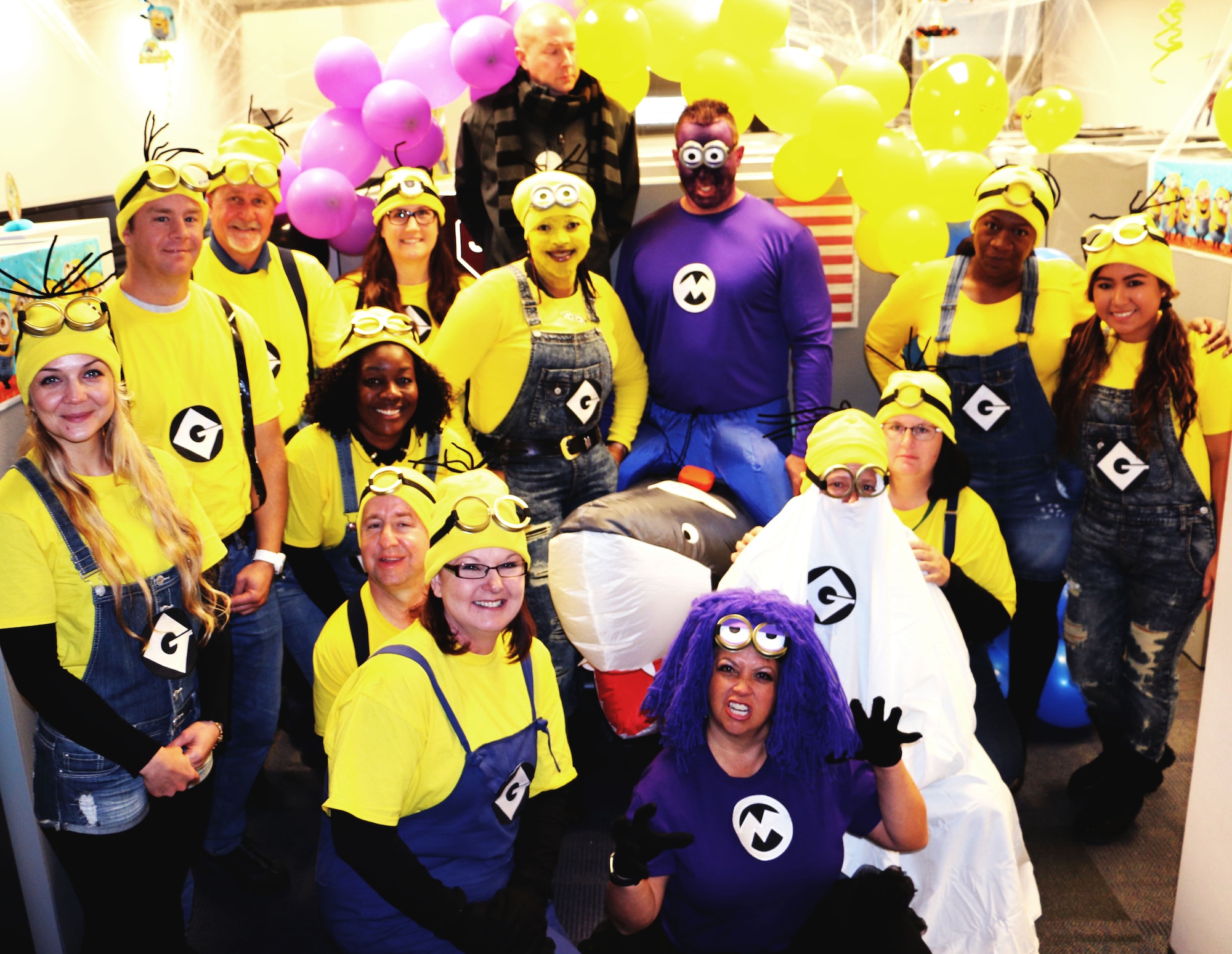 Members of the 21st Contracting Squadron Infrastructure Flight dressed as characters from the movie series "Despicable Me" Oct. 31, 2017 at Peterson Air Force Base, Colorado. Members were encouraged to dress in costume to celebrate Halloween. (U.S. Air Force photo by Staff Sgt. Erica Picariello)
