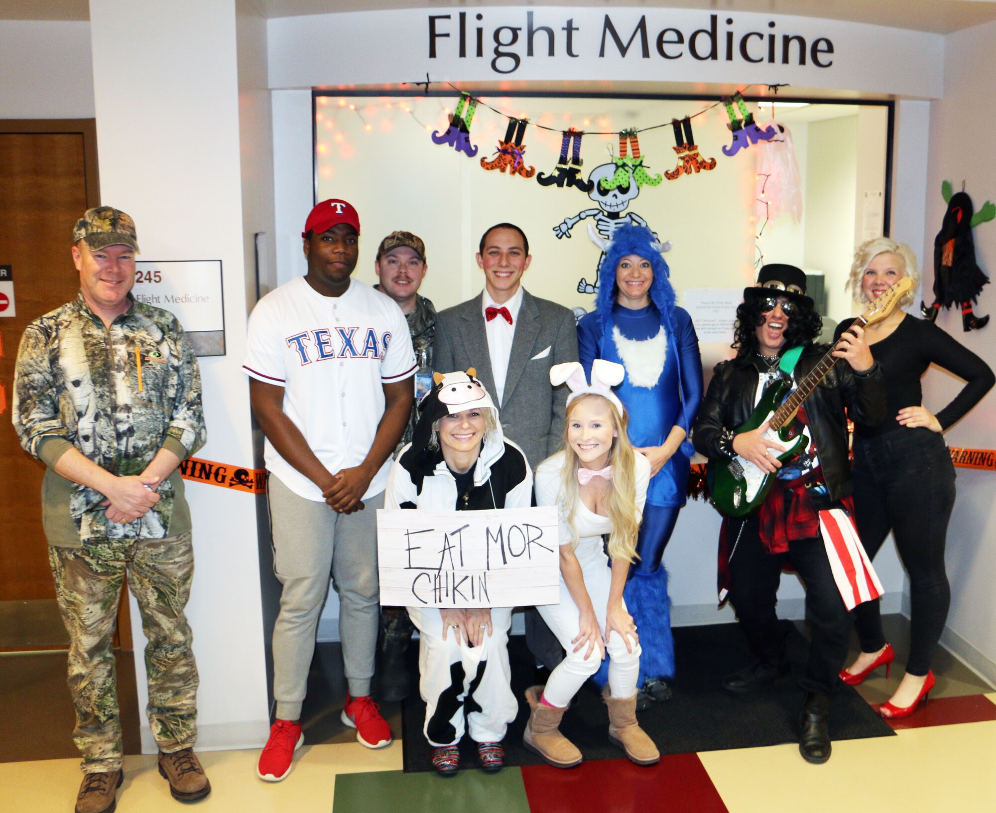 Members of the 21st Medical Group's Flight Medicine Flight dress in character for Halloween at Peterson Air Force Base, Colorado, Oct. 31, 2017. Some units on Peterson AFB dressed in costume to celebrate Halloween. (U.S. Air Force photo by Staff Sgt. Erica Picariello)