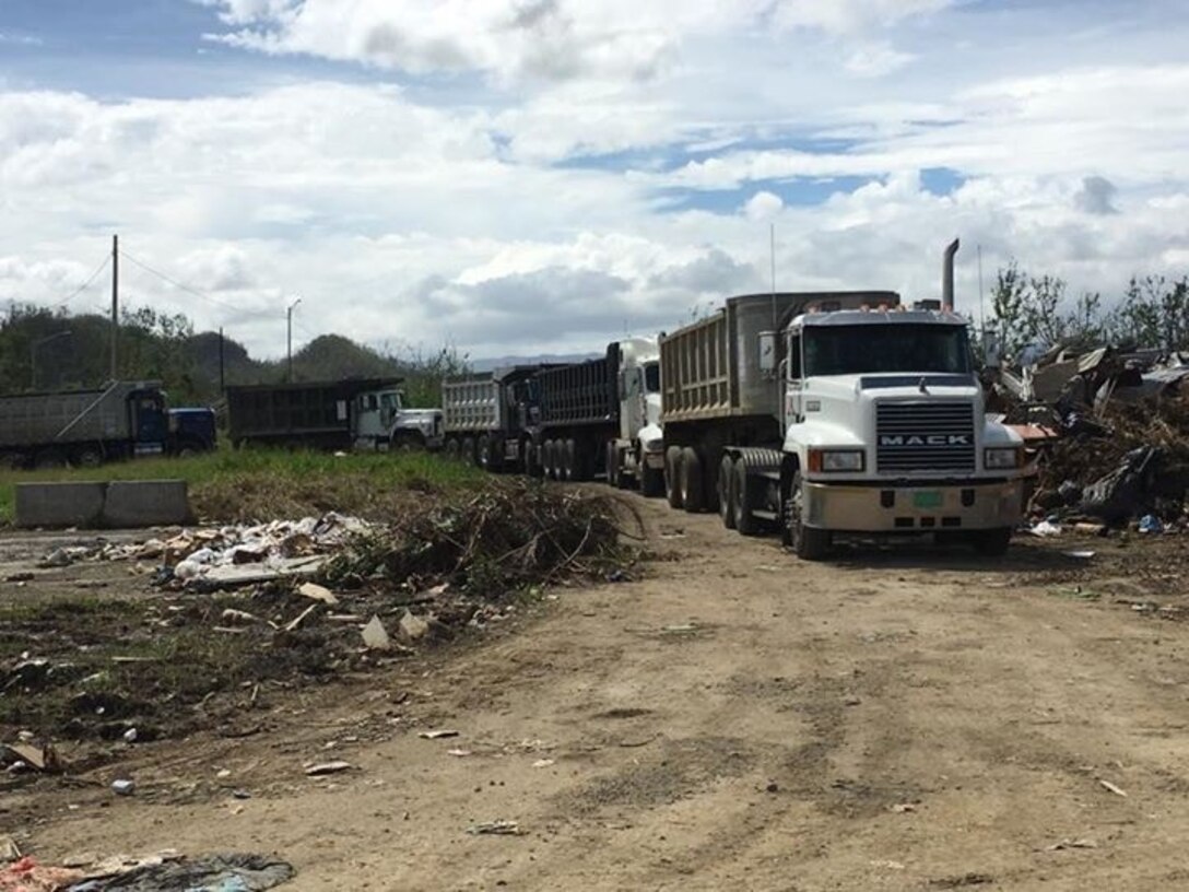 A local contractor hired by the U.S. Army Corps of Engineers disposes of debris left by Hurricane Maria at a landfill.