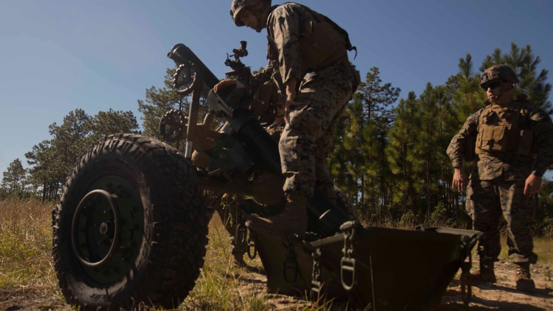 Marines prepare to fire a 120-mm mortar down range during a life-fire artillery exercise as part of Exercise Bold Alligator at Camp Lejeune, N.C. Oct. 23, 2017. Bold Alligator is designed to showcase the capabilities of the Navy-Marine Corps team, and demonstrate our cohesion with allied nations. The U.S. Marines and British troops gained camaraderie through integrated training, allowing them to familiarize themselves with each other’s capabilities. (U.S. Marine Corps Photo by Pfc. Nicholas Guevara)