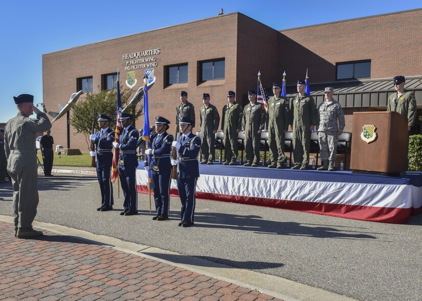 Langley Air Force Base Honor Guard members present the colors during the 1st Fighter Wing’s 100-year monument unveiling ceremony at Joint Base Langley-Eustis, Va., Oct. 27, 2017.