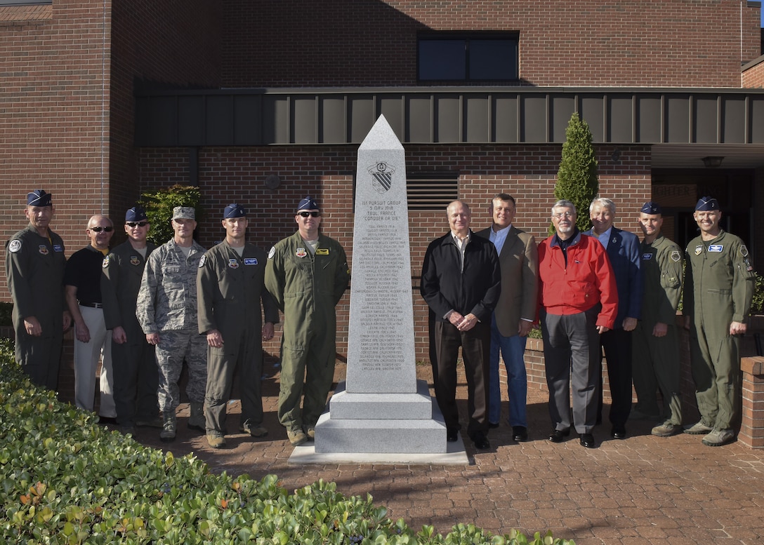 U.S. Air Force commanders and civilian representatives attending the 1st Fighter Wing’s 100-year monument ceremony pose for a group photo at Joint Base Langley-Eustis, Oct. 27, 2017.