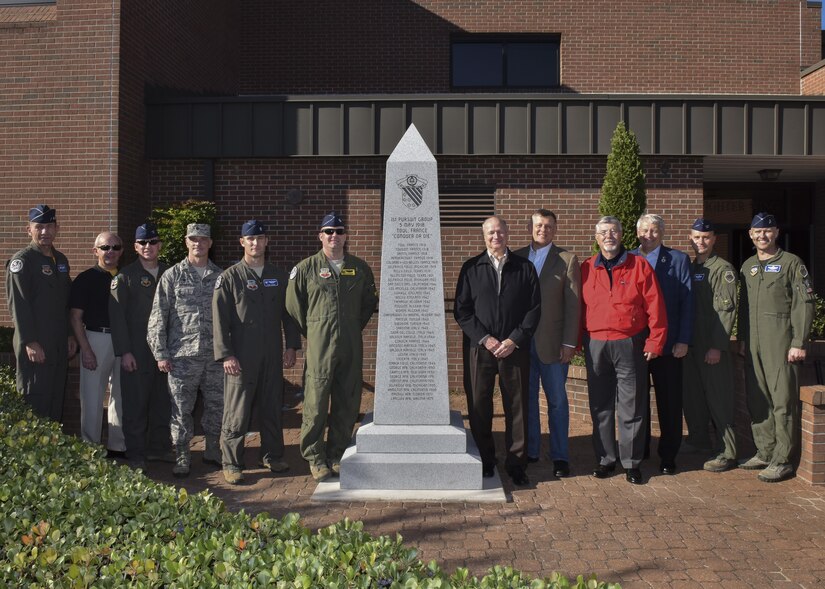 U.S. Air Force commanders and civilian representatives attending the 1st Fighter Wing’s 100-year monument ceremony pose for a group photo at Joint Base Langley-Eustis, Oct. 27, 2017.