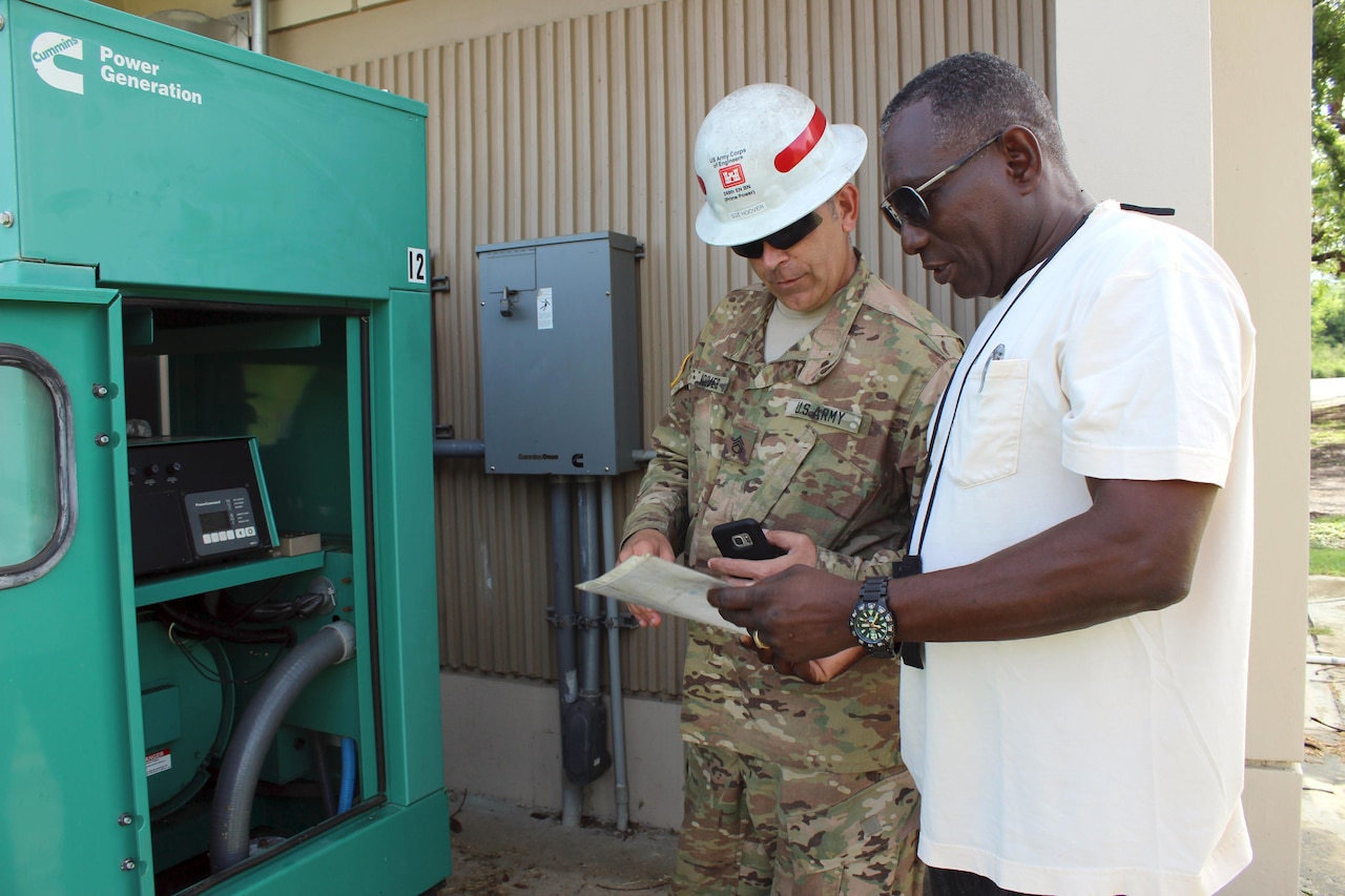 Army Staff Sgt. Jerry Hoover, a pre-installation inspection team member with the 249th Engineer Battalion, assesses a Cotton Valley Fire Department generator.