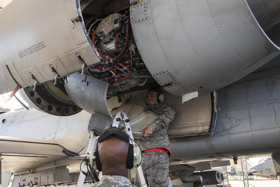 Airman 1st Class William Osborne, 23d Aircraft Maintenance Squadron, replaces the protective covering on the engine of an A-10C Thunderbolt II, Oct. 31, 2017, at Moody Air Force Base, Ga. Pilots, traveled to Eglin AFB, Fla., to participate in exercise COMBAT HAMMER. The exercise evaluates the effectiveness, maintainability, suitability and accuracy of precision guided munitions and high technology air to ground munitions from tactical deliveries against realistic targets with realistic enemy defenses. Moody’s team will be assessed and trained on how accurately and quickly a munition is built, loaded onto the aircraft and dropped from the aircraft onto a target. (U.S. Air Force photo by Senior Airman Janiqua P. Robinson)