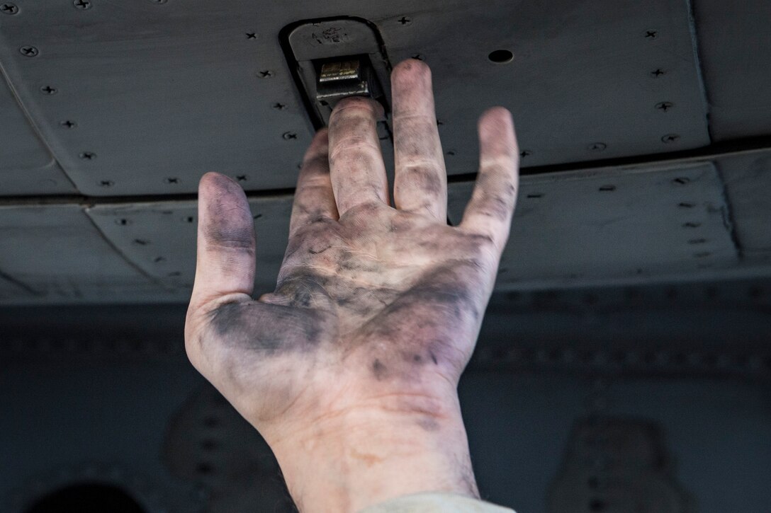 Airman 1st Class William Osborne, 23d Aircraft Maintenance Squadron, fastens a latch on the engine of an A-10C Thunderbolt II, Oct. 31, 2017, at Moody Air Force Base, Ga. Pilots, traveled to Eglin AFB, Fla., to participate in exercise COMBAT HAMMER. The exercise evaluates the effectiveness, maintainability, suitability and accuracy of precision guided munitions and high technology air to ground munitions from tactical deliveries against realistic targets with realistic enemy defenses. Moody’s team will be assessed and trained on how accurately and quickly a munition is built, loaded onto the aircraft and dropped from the aircraft onto a target. (U.S. Air Force photo by Senior Airman Janiqua P. Robinson)