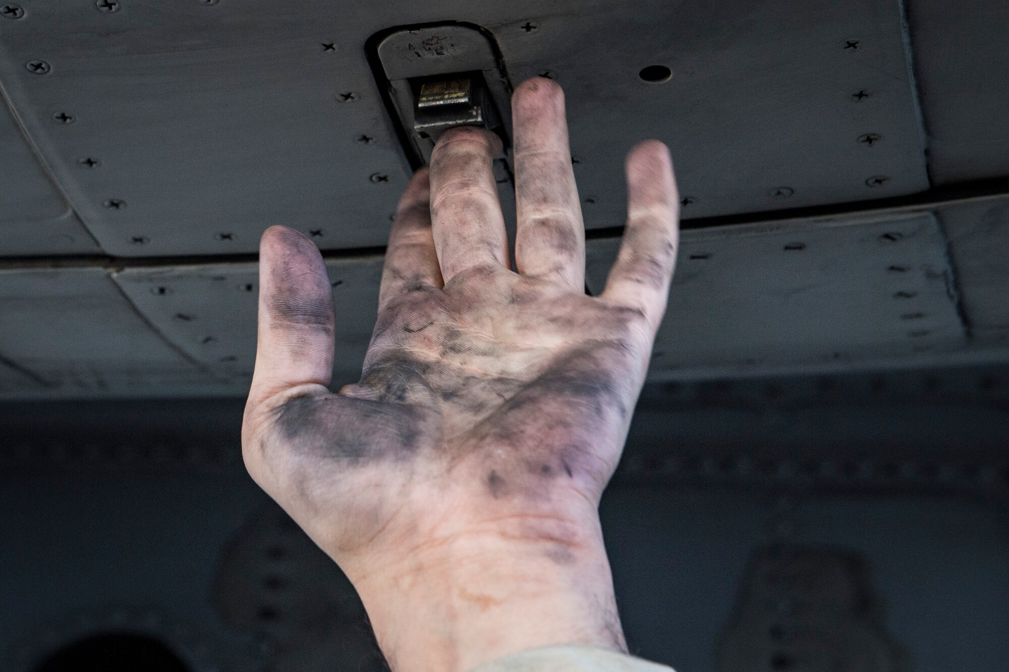 Airman 1st Class William Osborne, 23d Aircraft Maintenance Squadron, fastens a latch on the engine of an A-10C Thunderbolt II, Oct. 31, 2017, at Moody Air Force Base, Ga. Pilots, traveled to Eglin AFB, Fla., to participate in exercise COMBAT HAMMER. The exercise evaluates the effectiveness, maintainability, suitability and accuracy of precision guided munitions and high technology air to ground munitions from tactical deliveries against realistic targets with realistic enemy defenses. Moody’s team will be assessed and trained on how accurately and quickly a munition is built, loaded onto the aircraft and dropped from the aircraft onto a target. (U.S. Air Force photo by Senior Airman Janiqua P. Robinson)