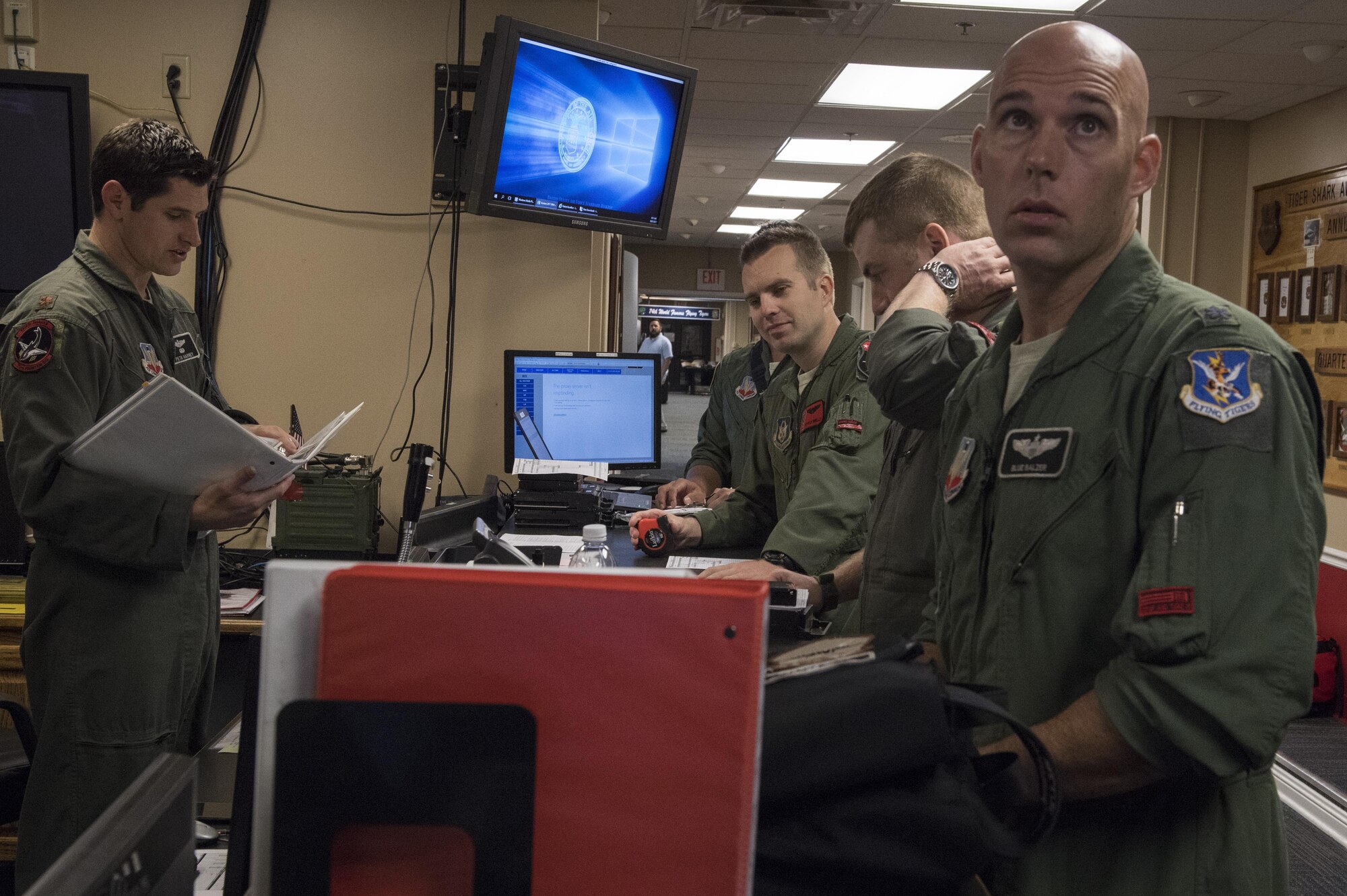 Pilots from the 75th Fighter Squadron receive a pre-departure briefing, Oct. 31, 2017, at Moody Air Force Base, Ga. Pilots, traveled to Eglin AFB, Fla., to participate in exercise COMBAT HAMMER. The exercise evaluates the effectiveness, maintainability, suitability and accuracy of precision guided munitions and high technology air to ground munitions from tactical deliveries against realistic targets with realistic enemy defenses. Moody’s team will be assessed and trained on how accurately and quickly a munition is built, loaded onto the aircraft and dropped from the aircraft onto a target. (U.S. Air Force photo by Senior Airman Janiqua P. Robinson)