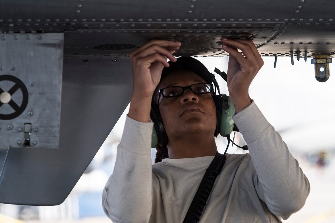 Airman 1st Class Tori Payne, 74th Aircraft Maintenance Unit crew chief performs a preflight systems check on an A-10C Thunderbolt II, Oct. 31, 2017, at Moody Air Force Base, Ga. Pilots, traveled to Eglin AFB, Fla., to participate in exercise COMBAT HAMMER. The exercise evaluates the effectiveness, maintainability, suitability and accuracy of precision guided munitions and high technology air to ground munitions from tactical deliveries against realistic targets with realistic enemy defenses. Moody’s team will be assessed and trained on how accurately and quickly a munition is built, loaded onto the aircraft and dropped from the aircraft onto a target. (U.S. Air Force photo by Senior Airman Janiqua P. Robinson)