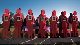 Silhouettes are displayed of fallen service members during a candlelight vigil ceremony at Joint Base Charleston, S.C., Oct. 30, 2017.