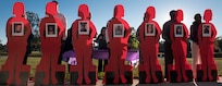 Silhouettes are displayed of fallen service members during a candlelight vigil ceremony at Joint Base Charleston, S.C., Oct. 30, 2017.