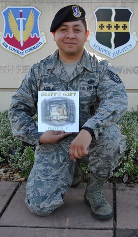 Tech Sgt. Frank Aguilar, 9th Reconnaissance Wing director of staff assistant, poses for a photo.