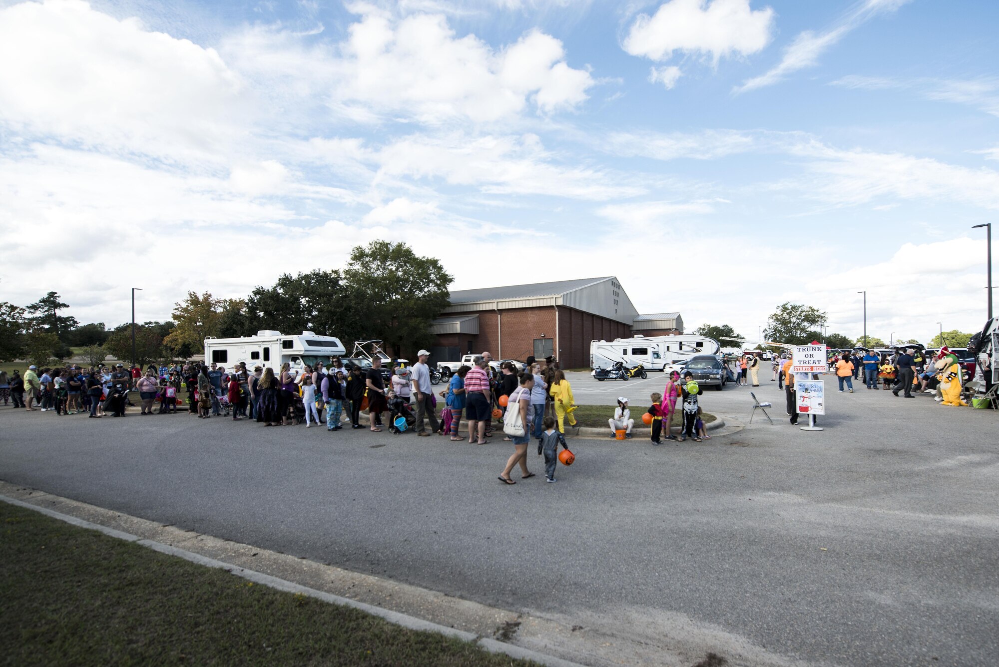 Team Shaw members wait in a line for the annual Boo Bash at Shaw Air Force Base, South Carolina, Oct. 28, 2017.