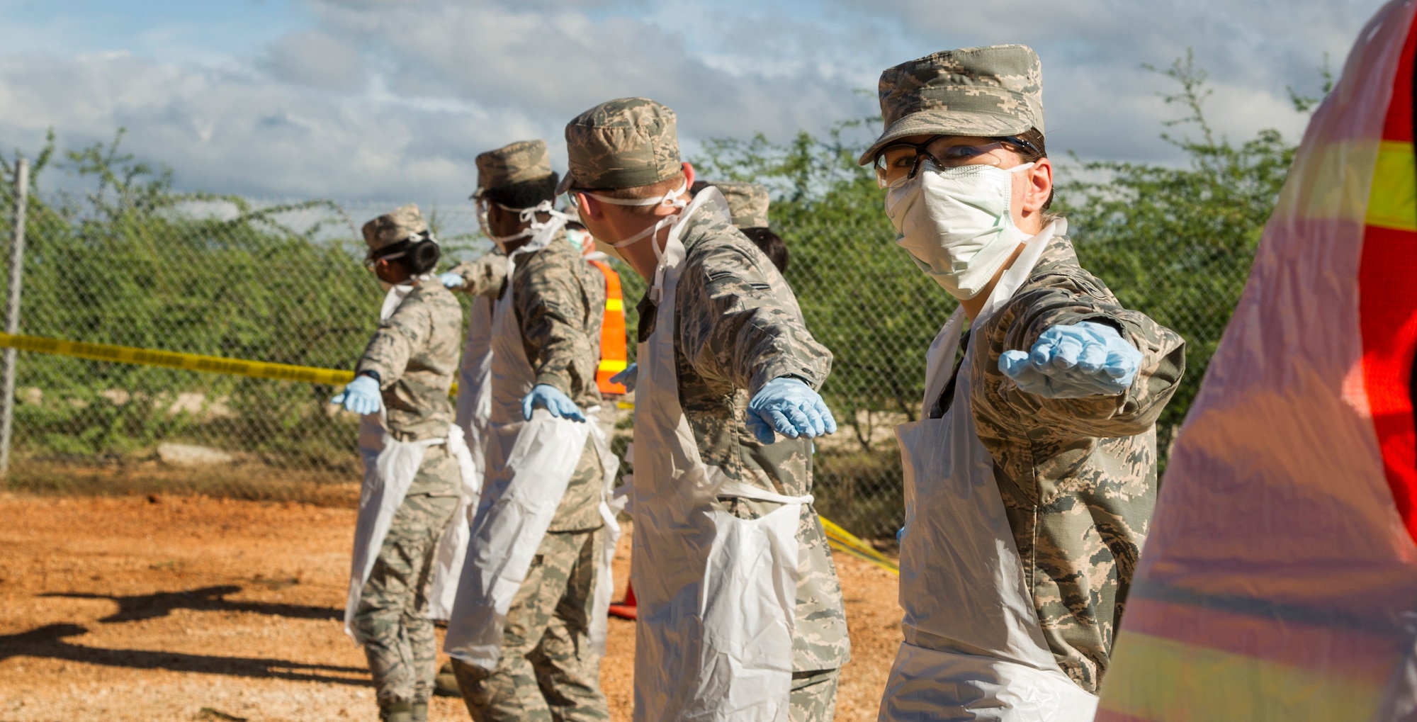 Airman 1st Class Hope Lockwood, 647th Force Support Squadron search and recovery team member, lines up with her teammates for a sweep during the search and recovery training event on Joint Base Pearl Harbor-Hickam, Hawaii, Oct. 27, 2017. The search and recovery team is tasked with recovering human remains from accident sites. (U.S. Air Force photo by Tech. Sgt. Heather Redman)