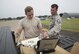 U.S. Air Force Airman 1st Class Tyler Bunn, left, a 35th Aircraft Maintenance Squadron crew chief, speaks with Master Sgt. Michael Mahaffey, right, the 35th AMXS assistant superintendent, on properly using a technical order computer to learn the functionality of an integrated servo actuator during the Misawa Ready Technician Program at Misawa Air Base, Japan, Aug. 22, 2017. The actuator is used for the F-16 Fighting Falcon’s flap around and step controls, giving the F-16 it’s high maneuverability, used in air-to- air combat and air-to-surface attack. (U.S. Air Force photo by Airman 1st Class Sadie Colbert)