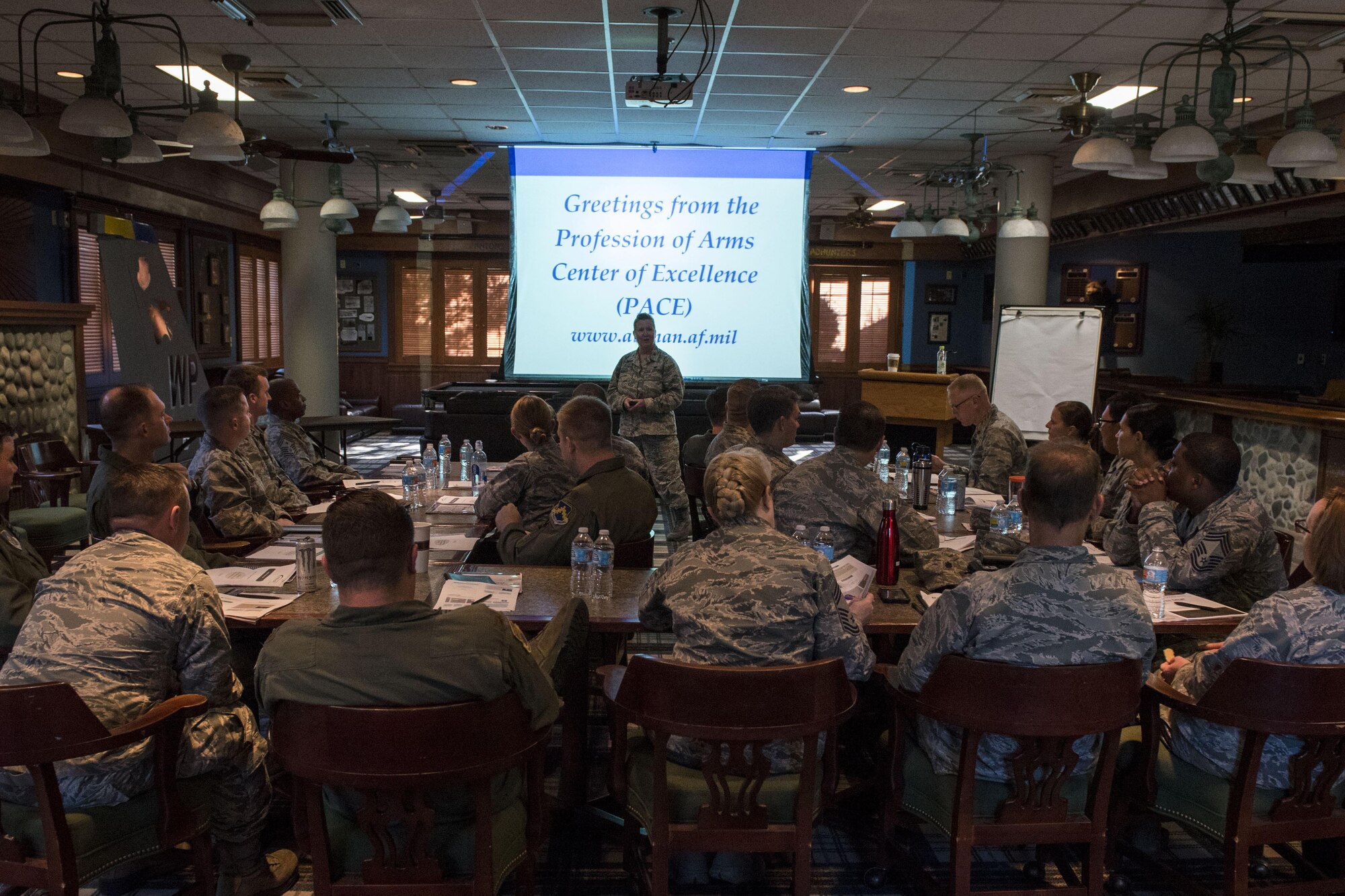 U.S. Air Force Col. Polly Kenny, Profession of Arms Center of Excellence senior consultant, speaks with participants during the Leadership Behavior DNA workshop at Kunsan Air Base, Republic of Korea, Sep. 1, 2017. Throughout the workshop, hosted by PACE, leadership from different organizations around Kunsan learned how to better themselves as leaders by gaining a better understanding of varying factors and traits involved with in interpersonal communications and leadership decision-making. (U.S. Air Force photo by Senior Airman Michael Hunsaker)