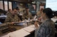U.S. Air Force Col. Joann Palmer, 8th Medical Group commander, right, converses with Col. Michael Zuhlsdorf, 8th Mission Support Group commander, and Lt. Col. Roberts, 8th Mission Support Group deputy commander, during the Leadership Behavior DNA workshop at Kunsan Air Base, Republic of Korea, Sep. 1, 2017. The workshop, hosted by The Profession of Arms Center of Excellence, allowed participants to learn about the different traits and factors involved with interpersonal communications and leadership decision-making. (U.S. Air Force photo by Senior Airman Michael Hunsaker)