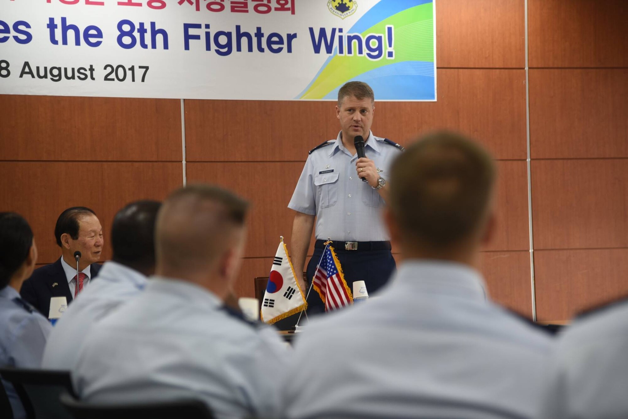 U.S. Air Force Col. David Shoemaker, 8th Fighter Wing commander, speaks at City Hall during an immersion tour in Gunsan City, Republic of Korea, Aug. 28, 2017. The tour aimed to strengthen the bonds and partnership between the Wolf Pack and the city of Gunsan. (U.S. Air Force photo by 2nd Lt. Brittany Curry)