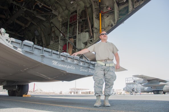 Master Sgt. Norbert Feist, 386th Expedtionary Aircraft Maintenance Squadron crew chef stands at the back of aircraft 1004 Wednesday, August 30th, at an undisclosed location in Southwest Asia. Feist has been the dedicated crew chief for aircraft 1004 for 21 years. (U.S. Air Force photo by Master Sgt. Eric M. Sharman)