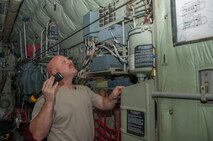 Master Sgt. Norbert Feist, 386th Expeditionary Aircraft Maintenance Squadron crew chef checks for any hydraulic leaks on aircraft 1004 Wednesday, August 30th, at an undisclosed location in Southwest Asia. Feist has been the dedicated crew chief for aircraft 1004 for 21 years. (U.S. Air Force photo by Master Sgt. Eric M. Sharman)