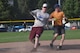 Kodie Bellew, 86th Maintenance Squadron softball player, makes it safely on a base during an intramural softball game Aug. 22, 2017, on Ramstein Air Base, Germany. Bellew played on the team as a dependent because his father works for the 86th MXS. (U.S. Air Force photo by Staff Sgt. Nesha Humes Stanton)