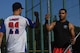 U.S. Air Force Airman 1st Class Kristopher Cooper, 86th Maintenance Squadron sheet metal technician, bumps fists with a teammate to celebrate a good inning during an intramural softball game on Ramstein Air Base, Germany, Aug 22, 2017. Cooper’s team went on to win the championship game, ending their season with 10 wins and two losses. (U.S. Air Force photo by Staff Sgt. Nesha Humes Stanton)