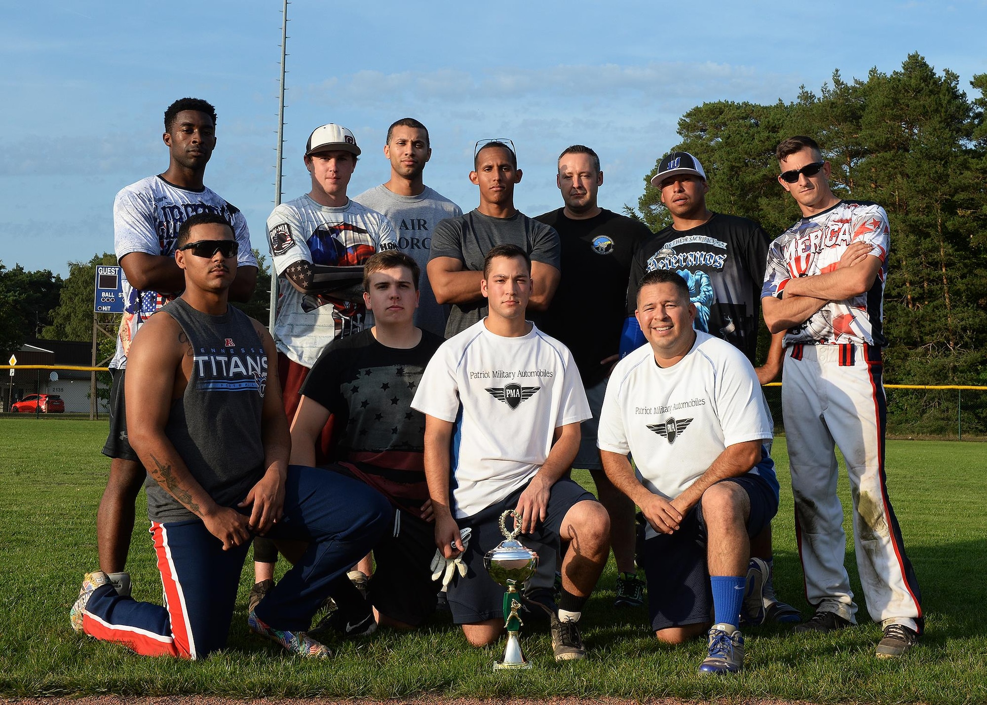 Members of the 86th Maintenance Squadron softball team pose for a photo after winning the intramural softball championship game on Ramstein Air Base, Germany, Aug. 23, 2017. During the championship game, the 86th MXS plated the 786th Force Support Squadron and emerged victorious by scoring 25 total runs. (U.S. Air Force photo by Senior Airman Jimmie D. Pike)