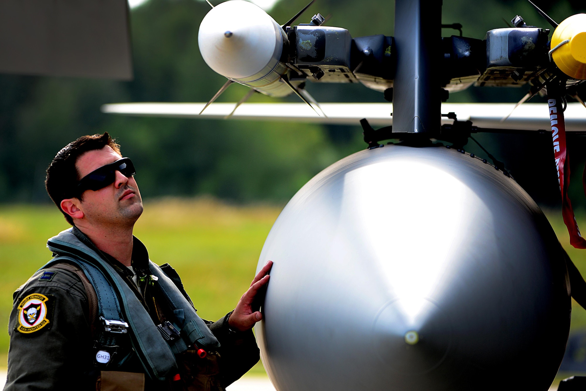 A pilot from the 493rd Expeditionary Fighter Squadron conducts a pre-flight inspection of his aircraft prior to a Baltic Air Police sortie at Siauliai Air Base, Lithuania, Aug. 31, 2017. The 493rd EFS will conduct routine patrols in the Baltic region for the next 120 days, maintaining a constant vigil over the sovereign airspace of Lithuania, Latvia and Estonia.(U.S. Air Force photo/ Tech. Sgt. Matthew Plew)