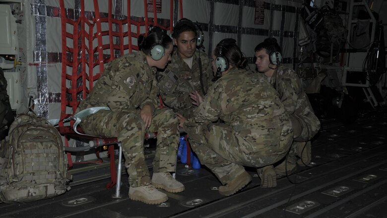 Members from the 71st Rescue Squadron and 23rd Logistics Readiness Squadron conduct a team meeting Aug. 31, 2017, to review mission requirements at College Station, Texas.