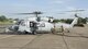 Members from the 23d Logistics Readiness Squadron forward area refueling point (FARP) team prepare to refuel a MH-60S Seahawk from the USS Dwight D. Eisenhower Aug. 31, 3017, at Jack Brooks Regional Airport in Beaumont, Texas.