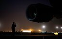A C-17 Globemaster III loadmaster, assigned to the 816th Expeditionary Airlift Squadron, performs pre-flight checks before a cargo supply mission in support of Operation Inherent Resolve at Al Udeid Air Base, Qatar, Aug. 18, 2017. The C-17 provides tactical airlift capabilities in the U.S. Central Command area of responsibility. (U.S. Air Force photo/Staff Sgt. Trevor T. McBride)