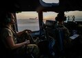 Airman 1st Class Elizabeth Silvers, left, an 816th Expeditionary Airlift Squadron C-17 Globemaster III loadmaster, and Capt. Travis Delzer, an 816th EAS C-17 pilot, prepare for takeoff before a mission in support of Operation Inherent Resolve, Aug. 23, 2017, at Al Udeid Air Base, Qatar. The C-17 is capable of rapid strategic delivery of troops and cargo and can be outfitted to perform tactical airlift, airdrop and aeromedical evacuation missions. (U.S. Air Force photo/Staff Sgt. Michael Battles)