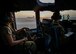 Airman 1st Class Elizabeth Silvers, left, an 816th Expeditionary Airlift Squadron C-17 Globemaster III loadmaster, and Capt. Travis Delzer, an 816th EAS C-17 pilot, prepare for takeoff before a mission in support of Operation Inherent Resolve, Aug. 23, 2017, at Al Udeid Air Base, Qatar. The C-17 is capable of rapid strategic delivery of troops and cargo and can be outfitted to perform tactical airlift, airdrop and aeromedical evacuation missions. (U.S. Air Force photo/Staff Sgt. Michael Battles)