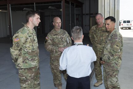 Brig. Gen. John B. Hashem talks with 2nd General Support Aviation Battalion, 501st Aviation Regiment Soldiers