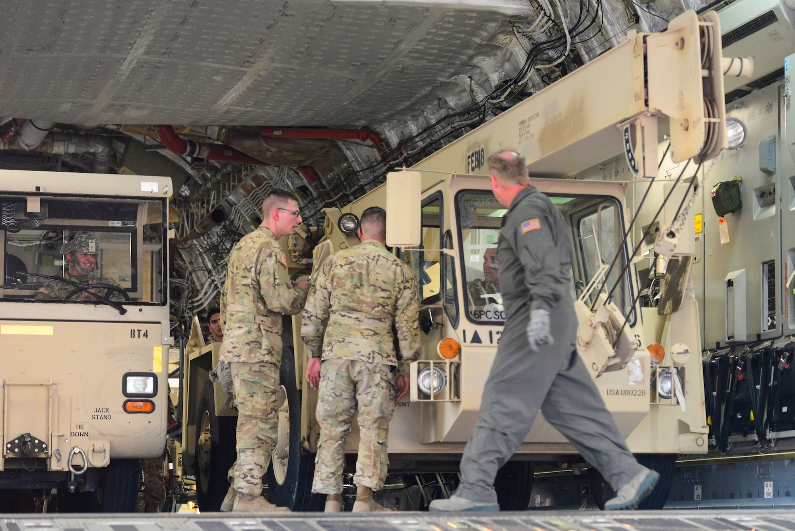 Members from the 502nd Logistics Readiness Squadron, the 433rd Airlift Wing, and the 445th Airlift Wing unload pallets and rolling stock containing maintenance equipment Aug. 30, 2017 at Joint Base San Antonio-Lackland Kelly Field, Texas.